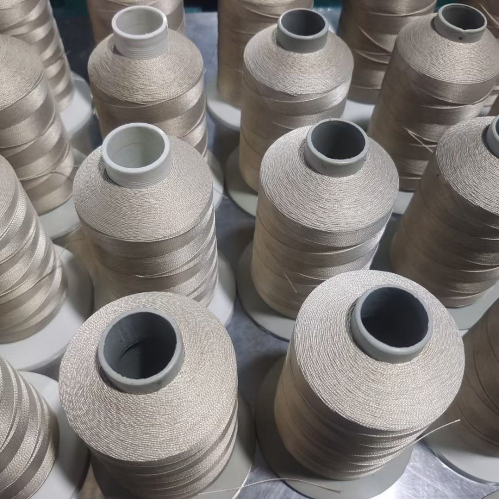 Met PTFE gecoat glasvezelnaaigaren: naaldmaat, spanning en breuk